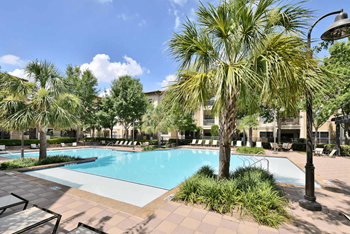 Resort-style swimming pool and sun deck